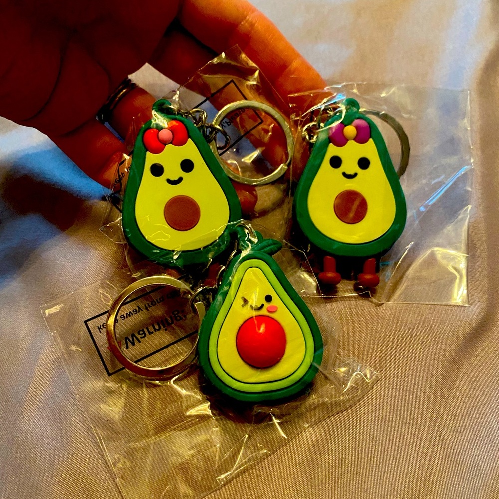 Lot of 3 avocado keychains or purse charms. Comes with gift box.